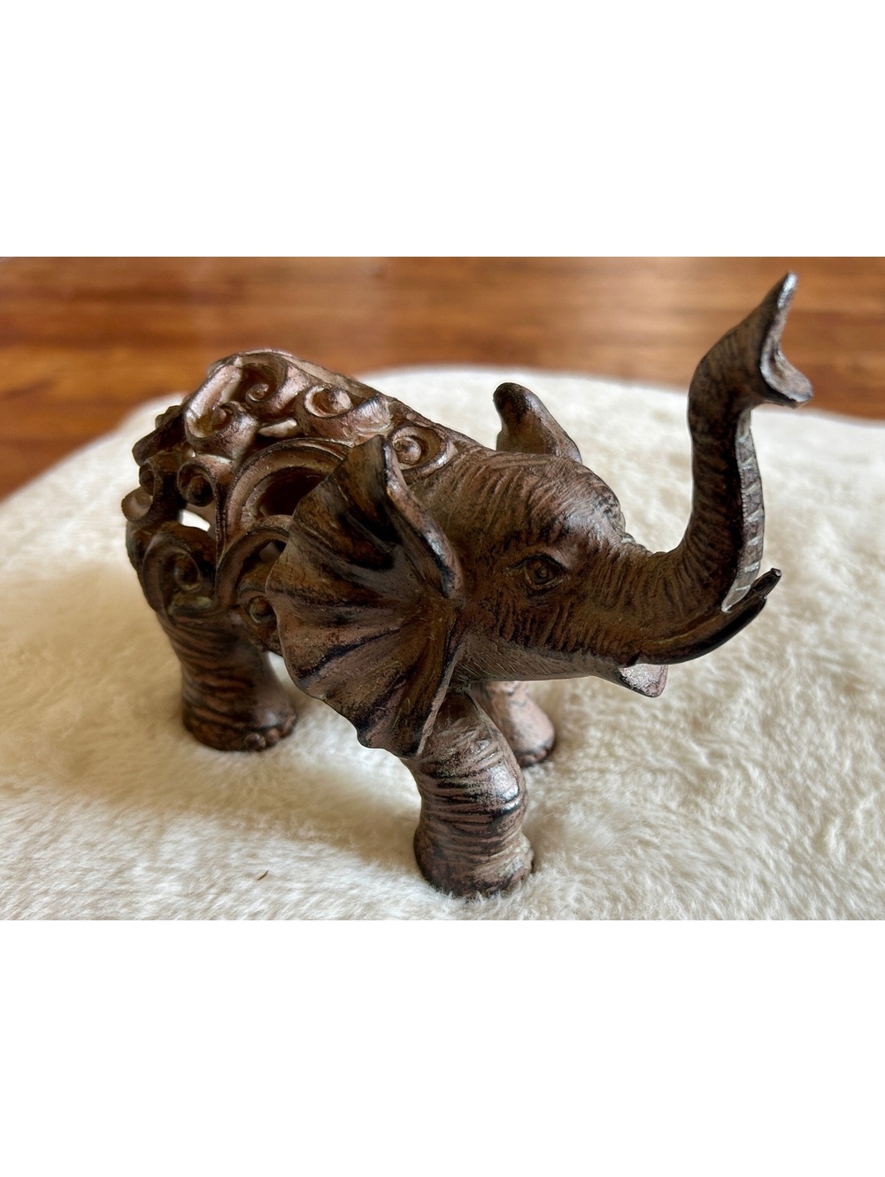 Hand Carved Wooden Elephant Figurine with Intricate Cutout Design